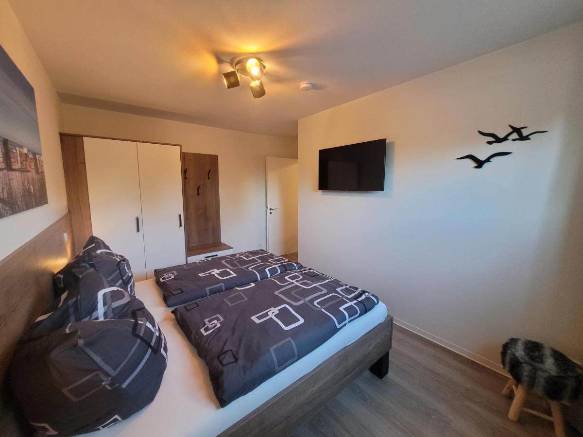 Strandkajuete Hooksiel Schillig Bagian luar foto